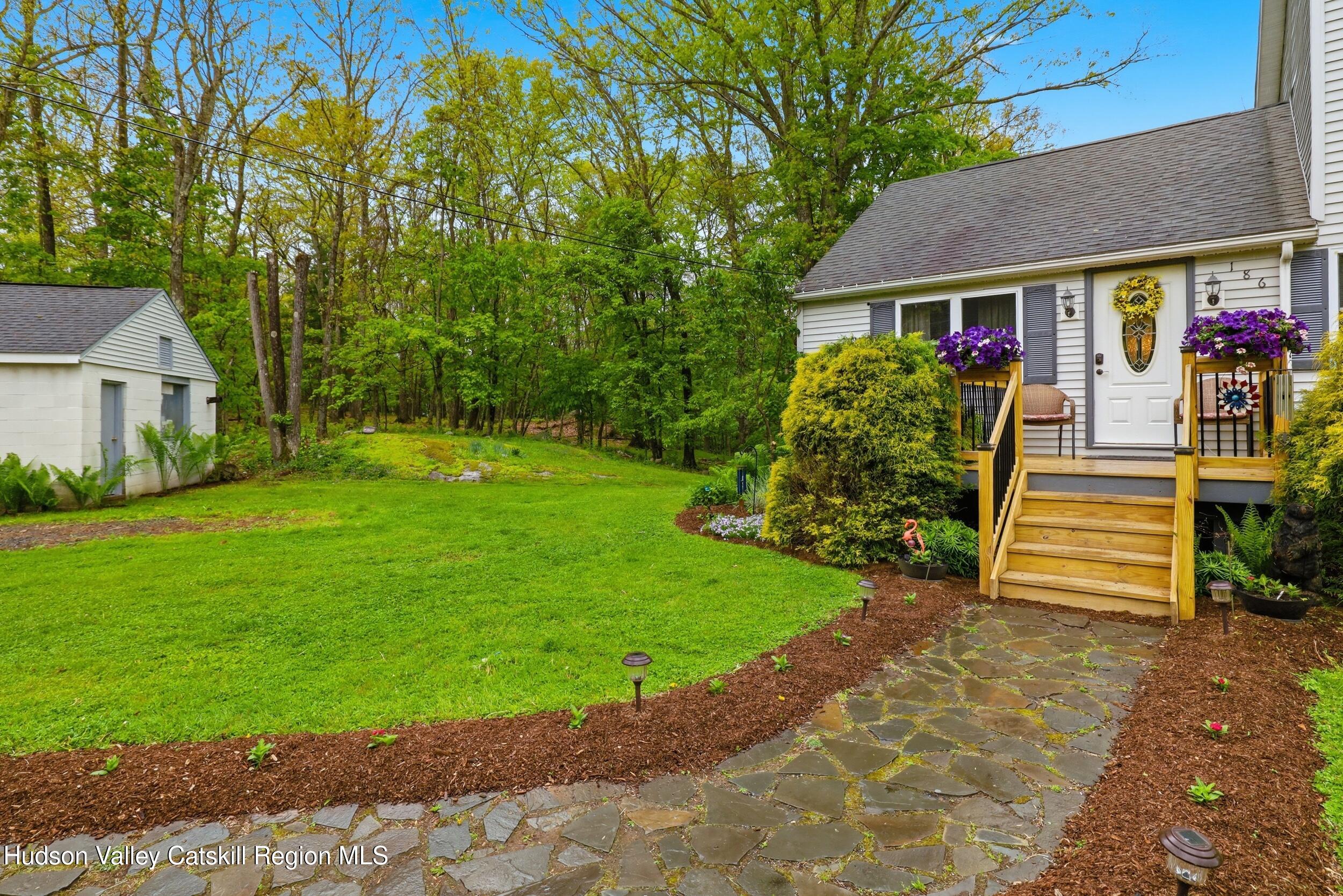186 Cedar Hill Road High Falls, NY 12440 - Photo 4 of 33 a front view of a house with a yard