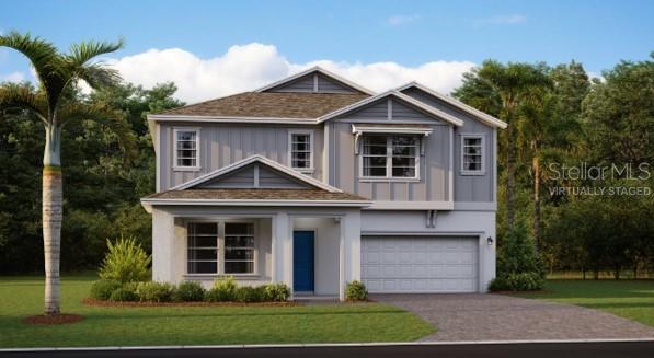 2871 Haze Road Clermont, FL 34714 - Photo 1 of 1 a front view of a house with a yard and trees
