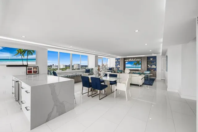 a view of a living room and dining room