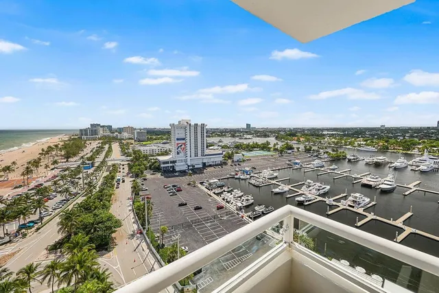 a dining room with furniture a window and kitchen view