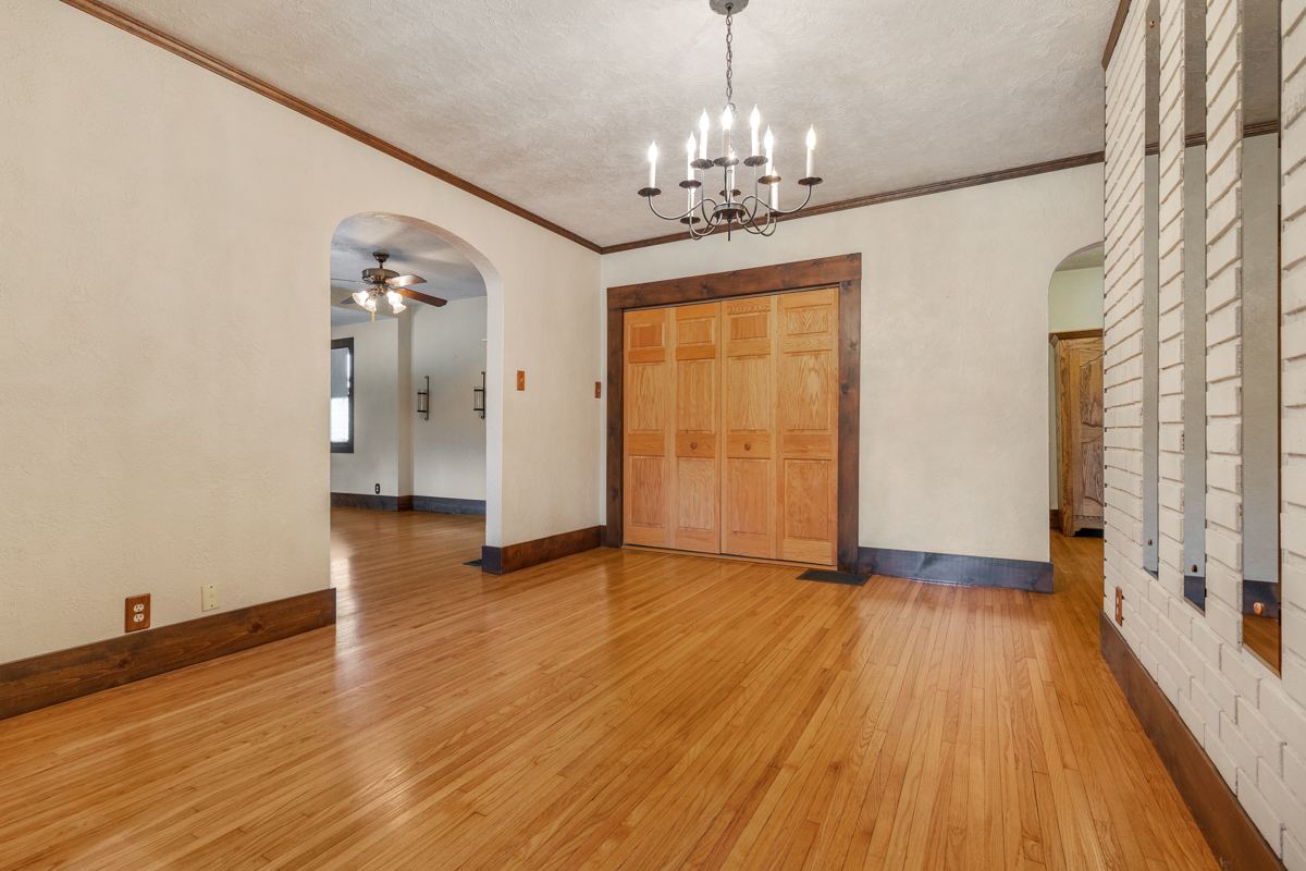 18633 Main Street Mokena, IL 60448 - Photo 13 of 24 a view of livingroom with chandelier and wooden floor