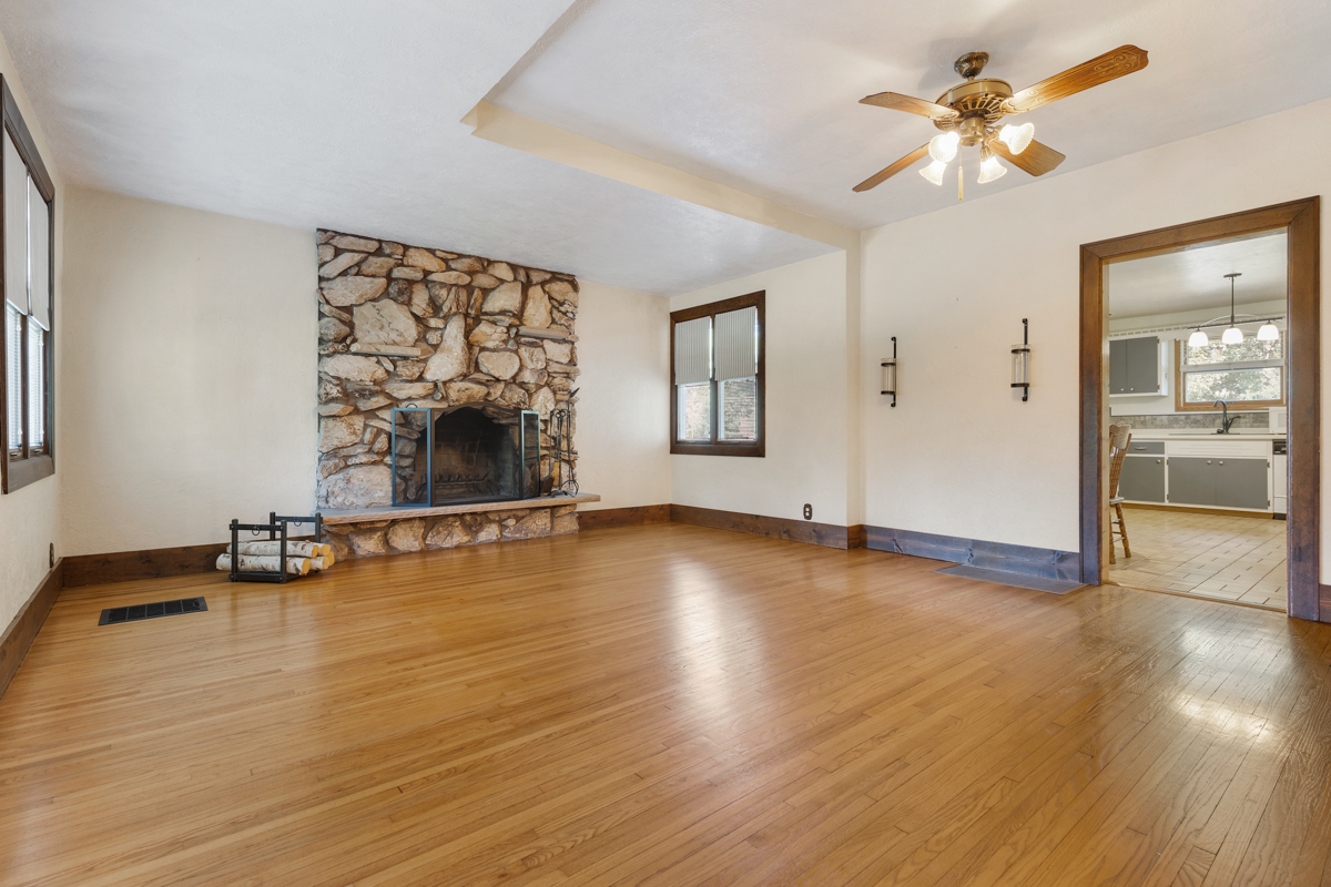 18633 Main Street Mokena, IL 60448 - Photo 15 of 24 an empty room with wooden floor and a floor to ceiling window