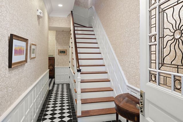 a view of entryway with wooden floor