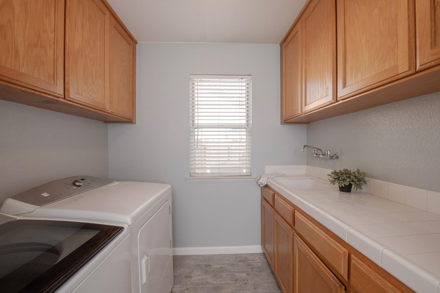 1847 Goshen Avenue Clovis, CA 93611 - Photo 13 of 39 a view of a kitchen with sink and cabinets