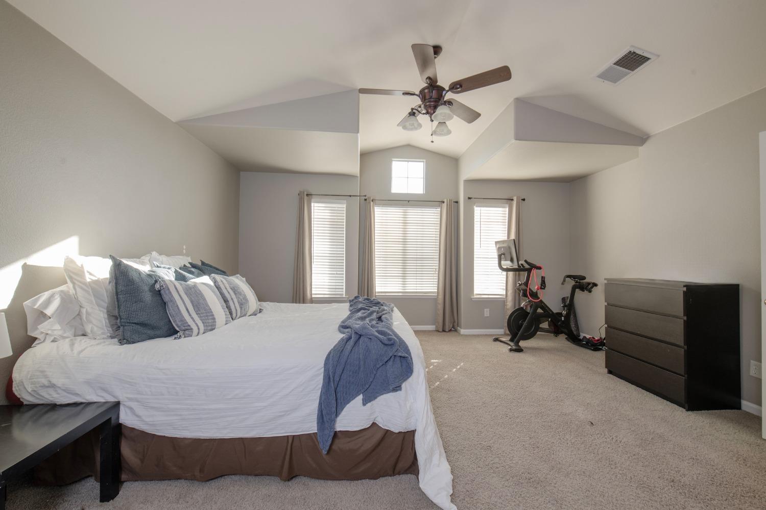 1847 Goshen Avenue Clovis, CA 93611 - Photo 21 of 39 a bed room with furniture and a window