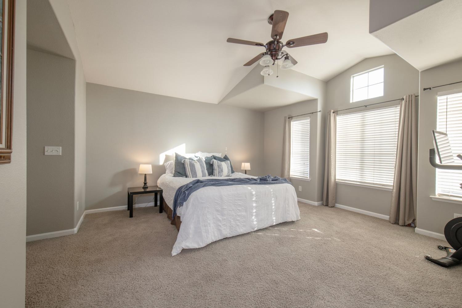 1847 Goshen Avenue Clovis, CA 93611 - Photo 26 of 39 a bedroom with a bed and a window