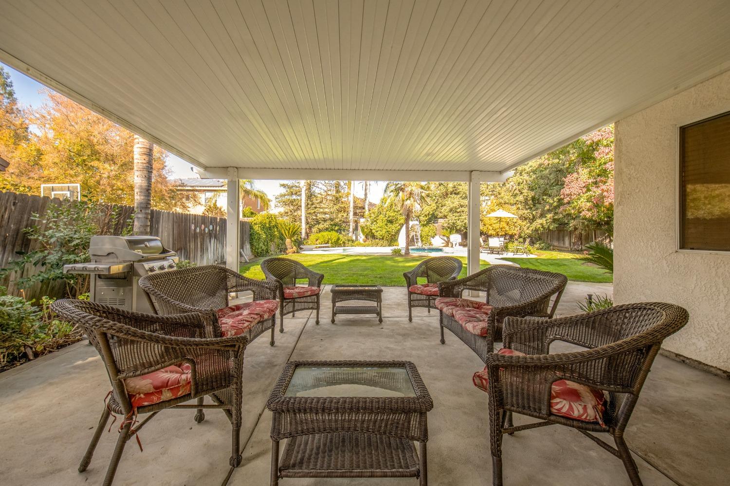 1847 Goshen Avenue Clovis, CA 93611 - Photo 30 of 39 a living room with furniture and a floor to ceiling window