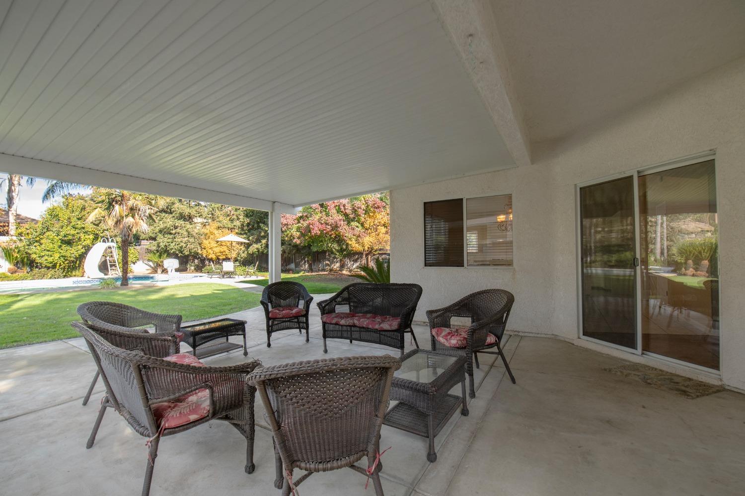 1847 Goshen Avenue Clovis, CA 93611 - Photo 31 of 39 a dining room with furniture and garden view