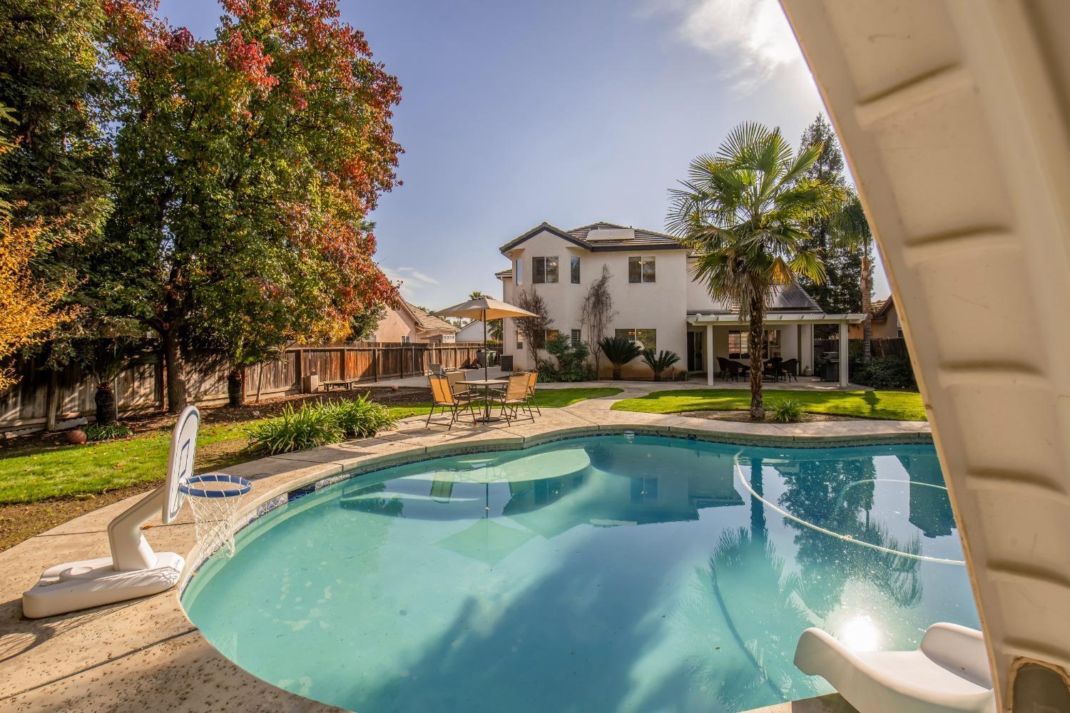 1847 Goshen Avenue Clovis, CA 93611 - Photo 38 of 39 swimming pool view with a outdoor seating