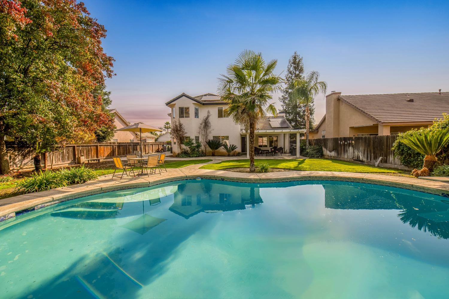 1847 Goshen Avenue Clovis, CA 93611 - Photo 39 of 39 a view of swimming pool with palm trees
