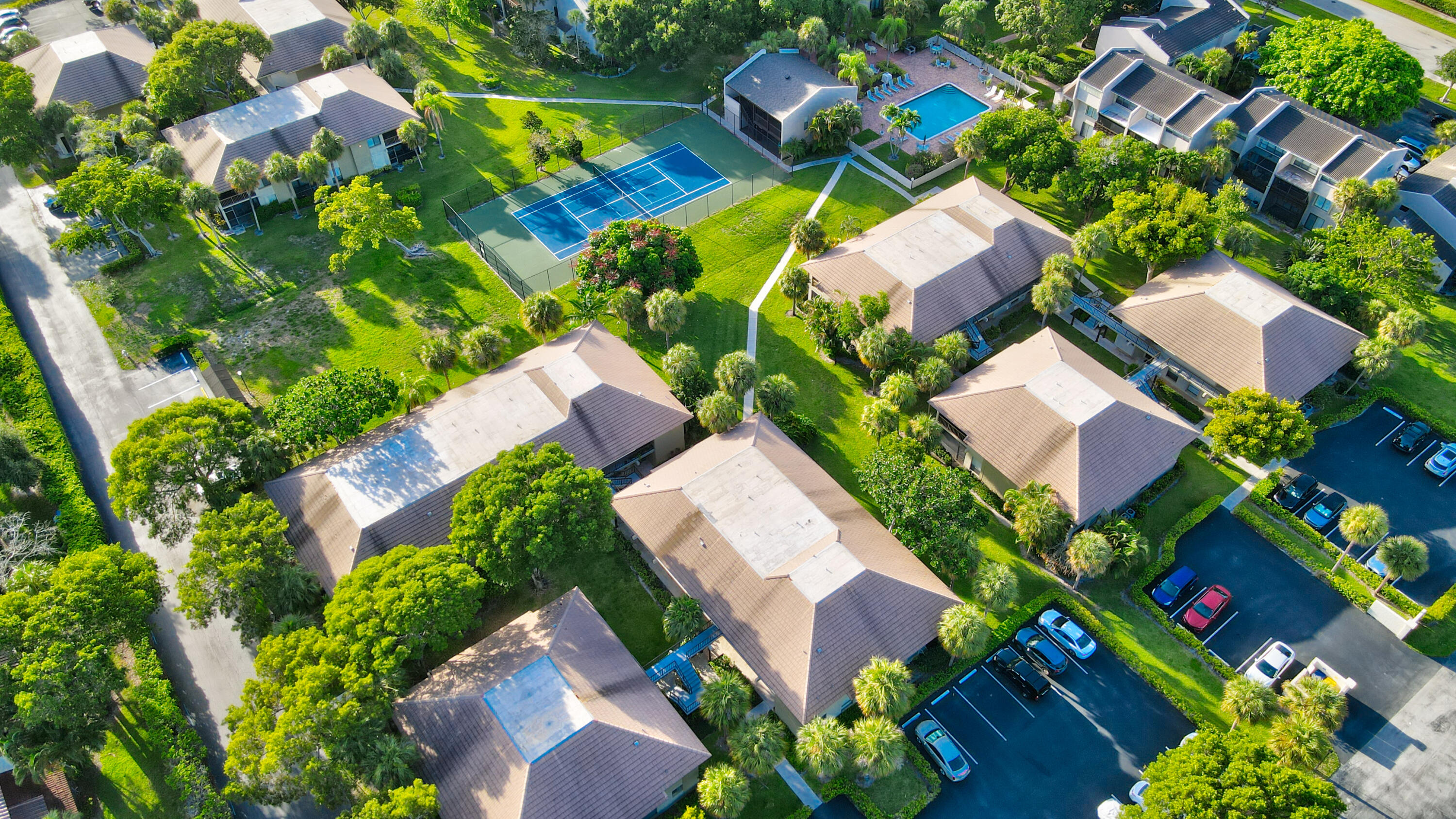 159 Northwest 70th Street, Unit 516 Boca Raton, FL 33487 - Photo 11 of 39 an aerial view of residential house with outdoor space and swimming pool