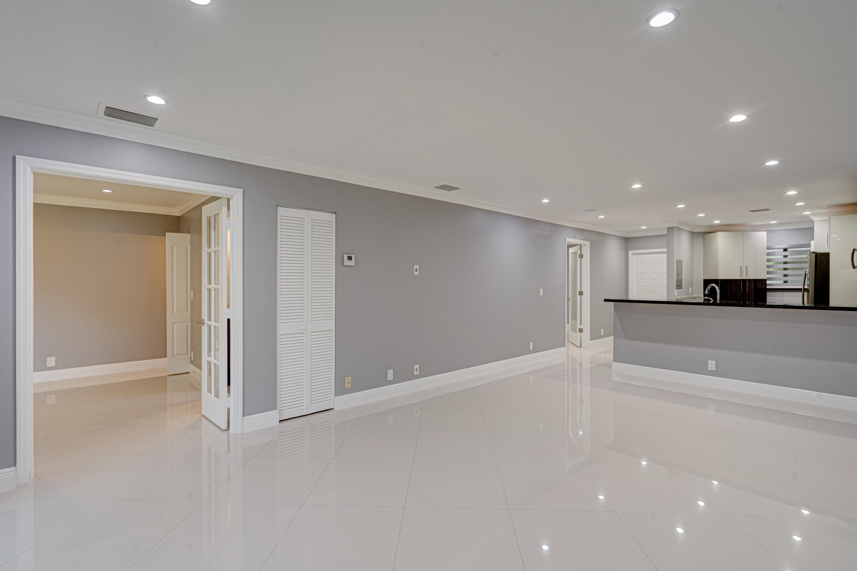 159 Northwest 70th Street, Unit 516 Boca Raton, FL 33487 - Photo 27 of 39 a view of a hallway