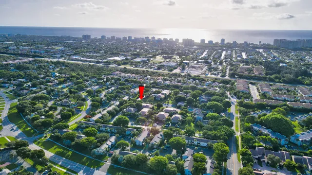 an aerial view of residential houses with city view and lake view