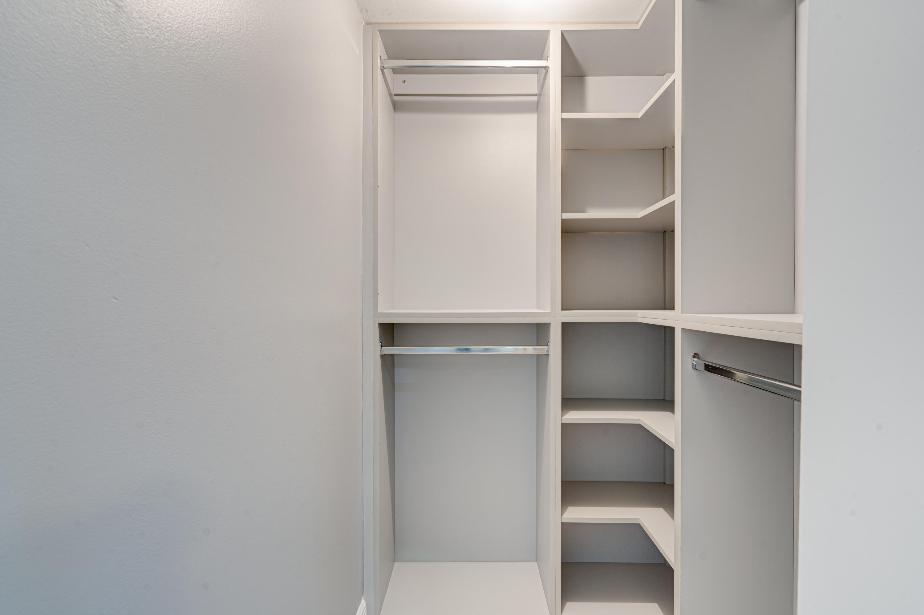 159 Northwest 70th Street, Unit 516 Boca Raton, FL 33487 - Photo 31 of 39 a view of an empty walk in closet