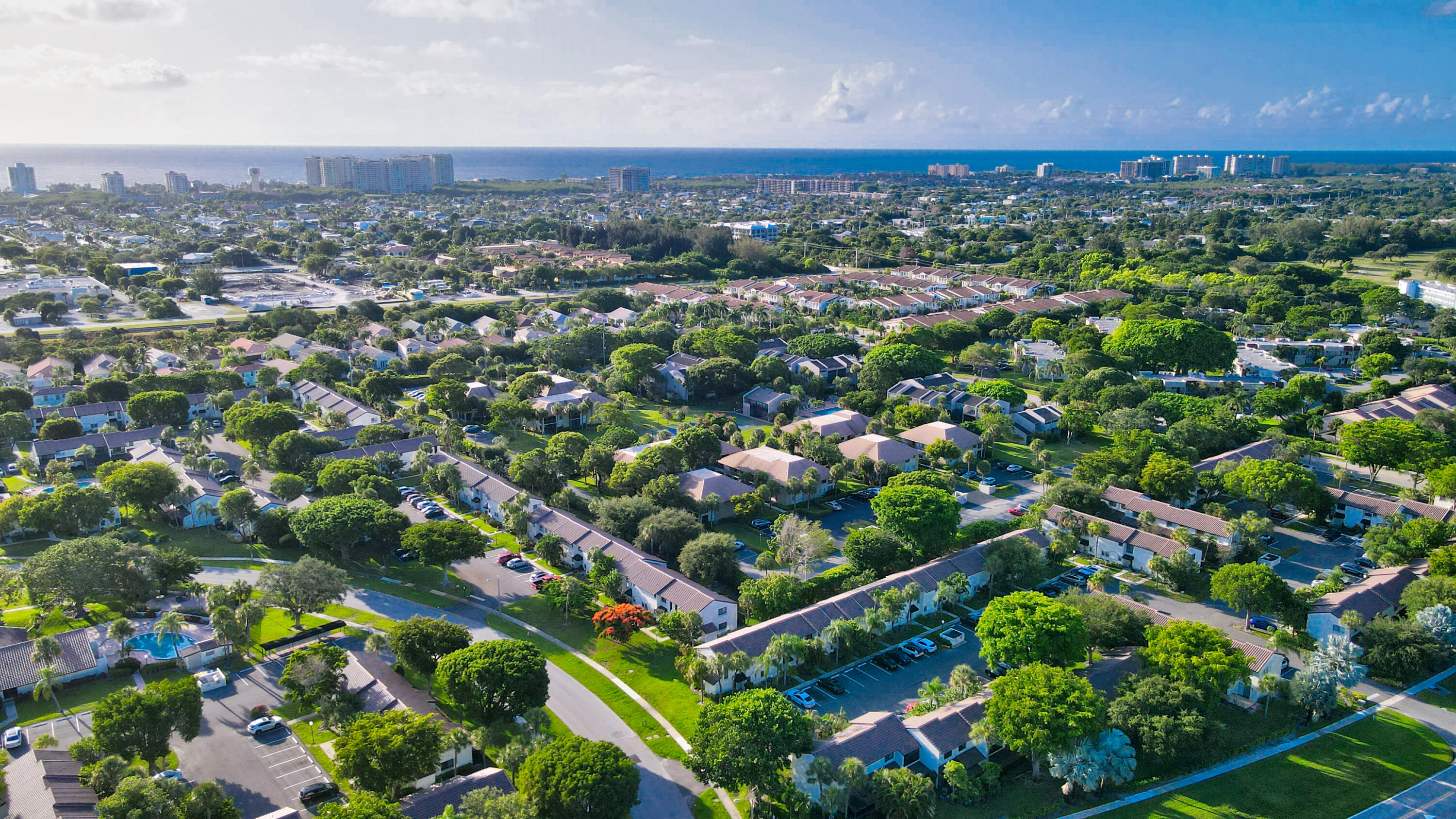 159 Northwest 70th Street, Unit 516 Boca Raton, FL 33487 - Photo 6 of 39 an aerial view of multiple house