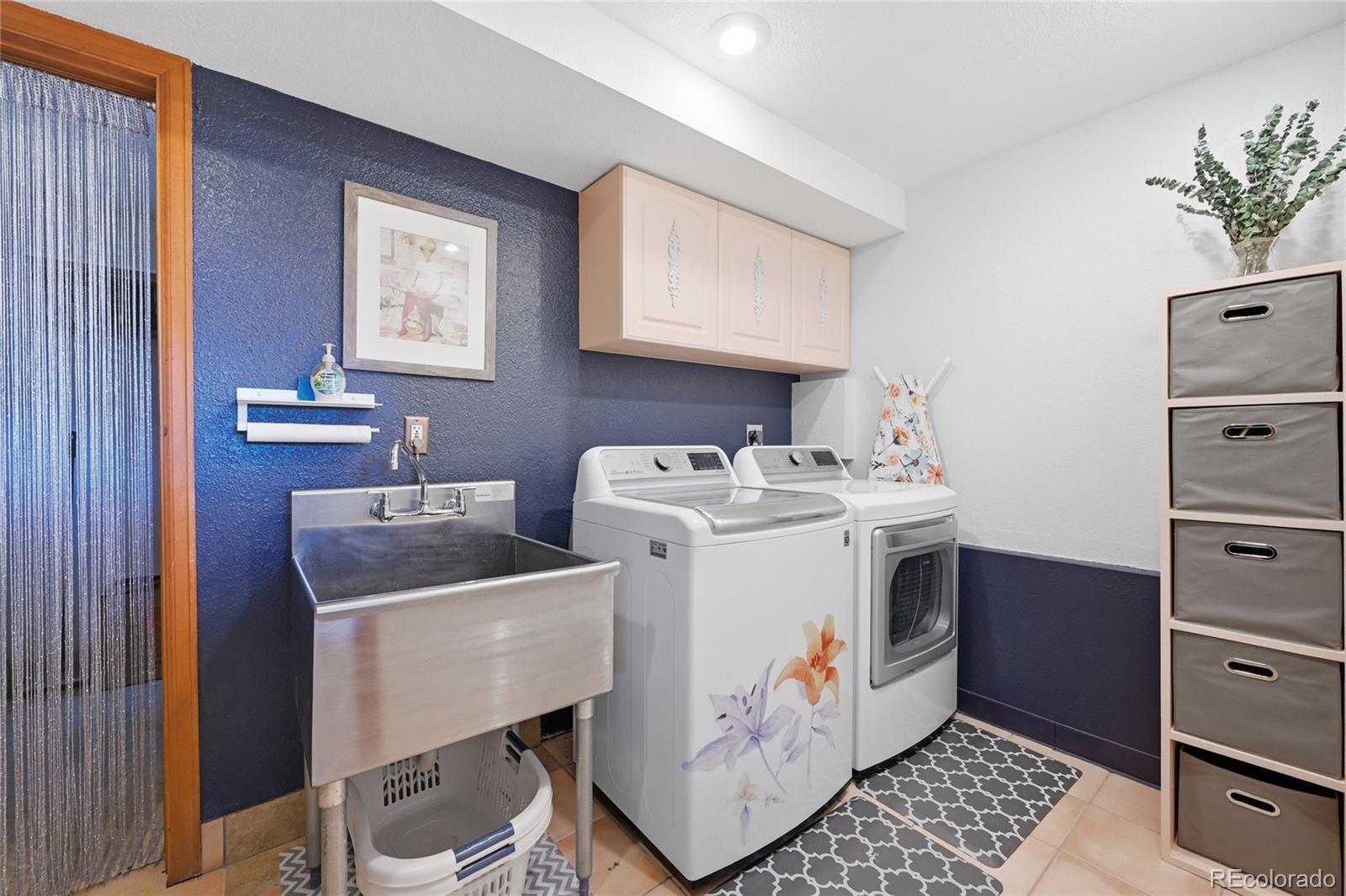 16 Auk Lane Bailey, CO 80421 - Photo 23 of 39 a utility room with dryer and washer