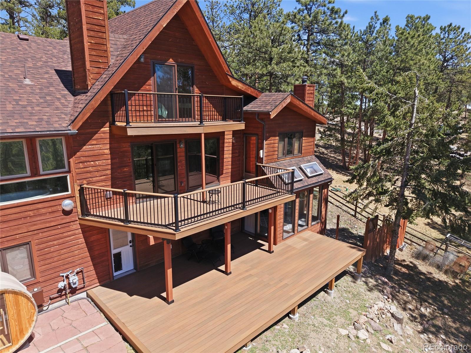16 Auk Lane Bailey, CO 80421 - Photo 31 of 39 a view of a house with wooden deck
