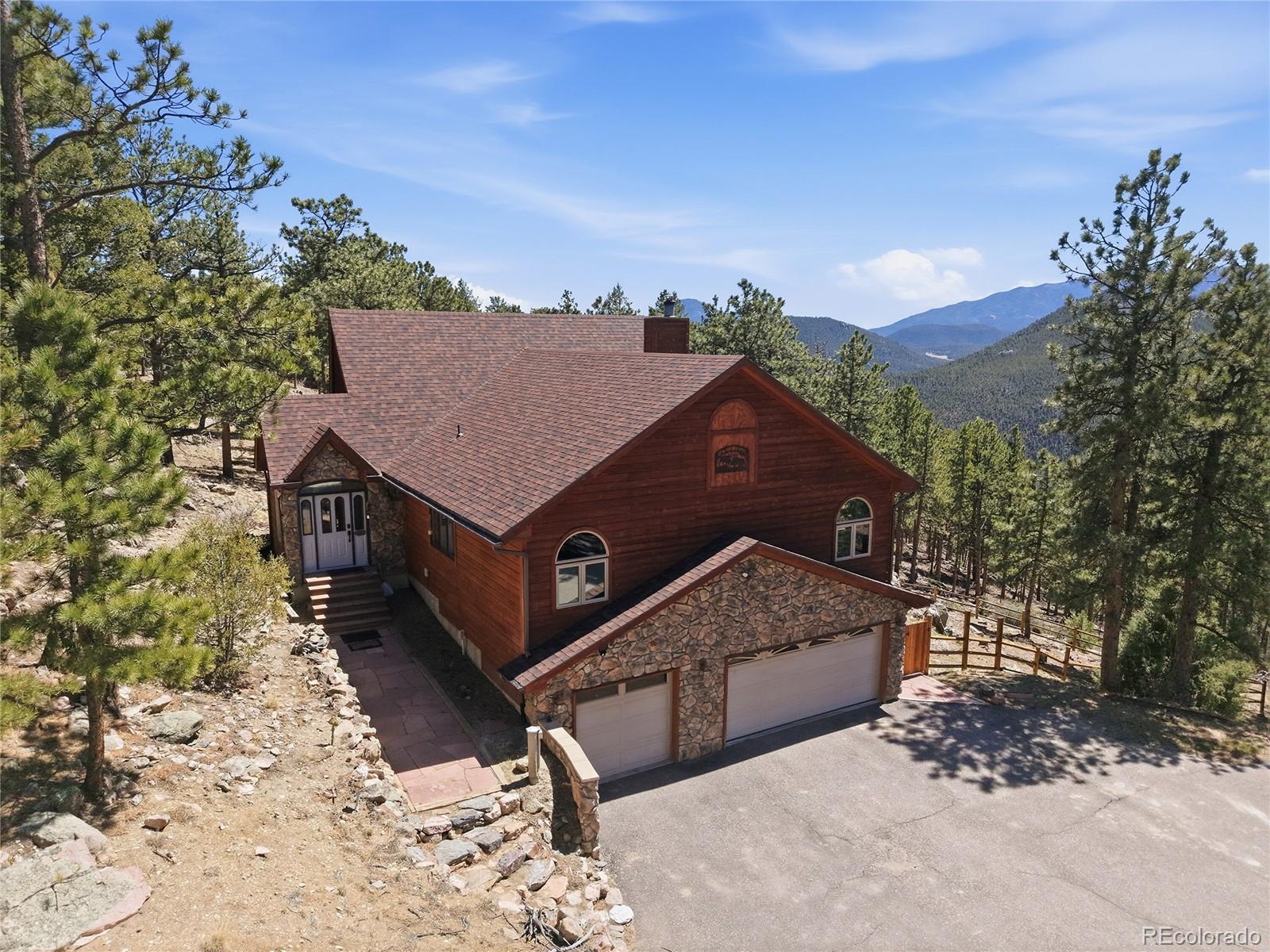 16 Auk Lane Bailey, CO 80421 - Photo 32 of 39 a house view with a outdoor space
