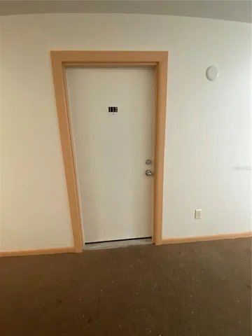 a kitchen with stainless steel appliances granite countertop a stove and a refrigerator