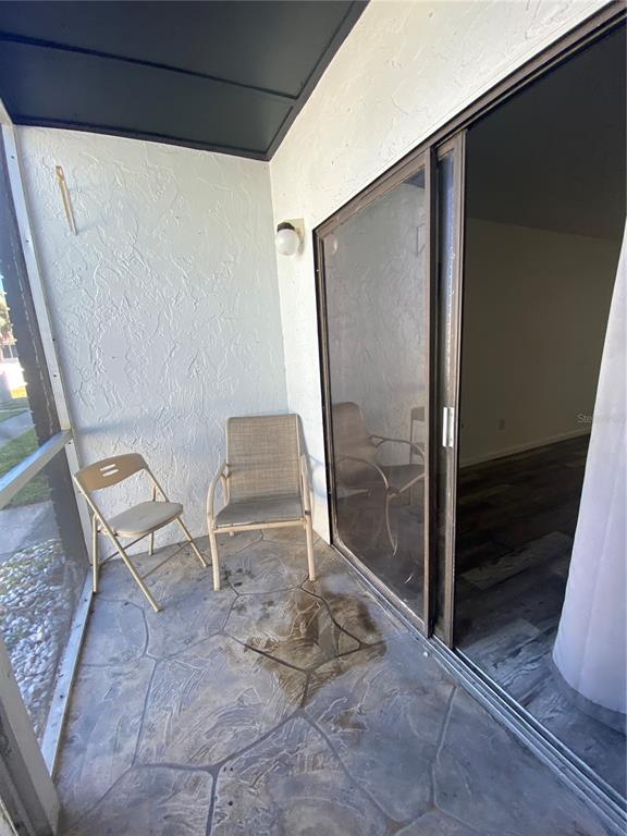 22302 Vick Street, Unit 112 Punta Gorda, FL 33980 - Photo 9 of 10 a view of an outdoor space with seating area