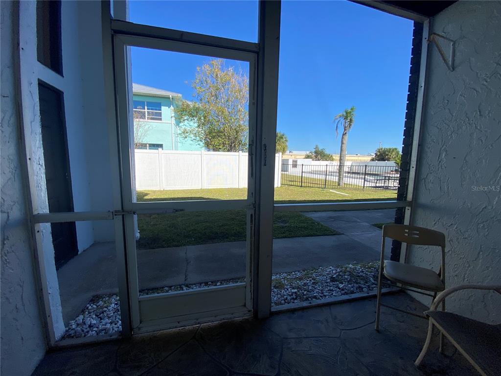 22302 Vick Street, Unit 112 Punta Gorda, FL 33980 - Photo 10 of 10 a bathroom with a glass shower door