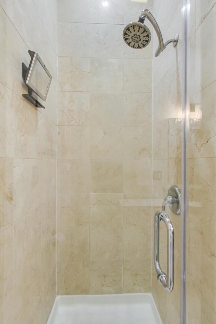 933 West Wolfram Street, Unit 2 Chicago, IL 60657 - Photo 16 of 24 a bathroom with a shower