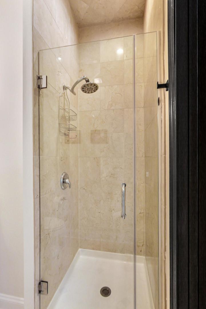933 West Wolfram Street, Unit 2 Chicago, IL 60657 - Photo 21 of 24 a bathroom with a shower