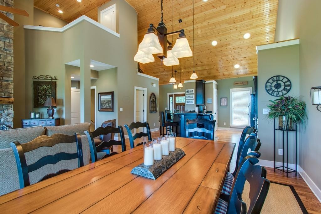 111 Vista Point Road, Unit 111 Silver Point, TN 38582 - Photo 11 of 30 a view of a dining room and hall with wooden floor