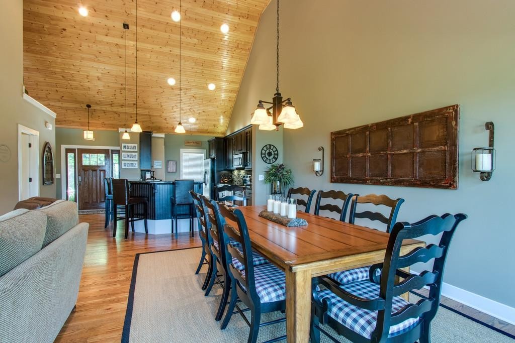 111 Vista Point Road, Unit 111 Silver Point, TN 38582 - Photo 10 of 30 a view of a dining room with furniture and wooden floor