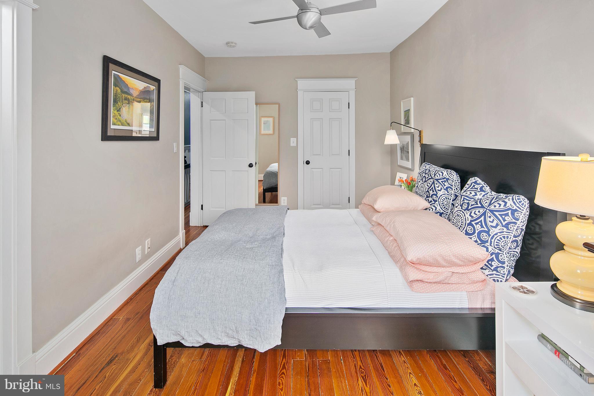 1437 G Street Northeast Washington, DC 20002 - Photo 16 of 24 a bedroom with a bed and lamp