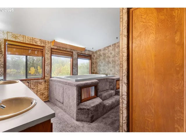 a utility room with a sink a washer and dryer