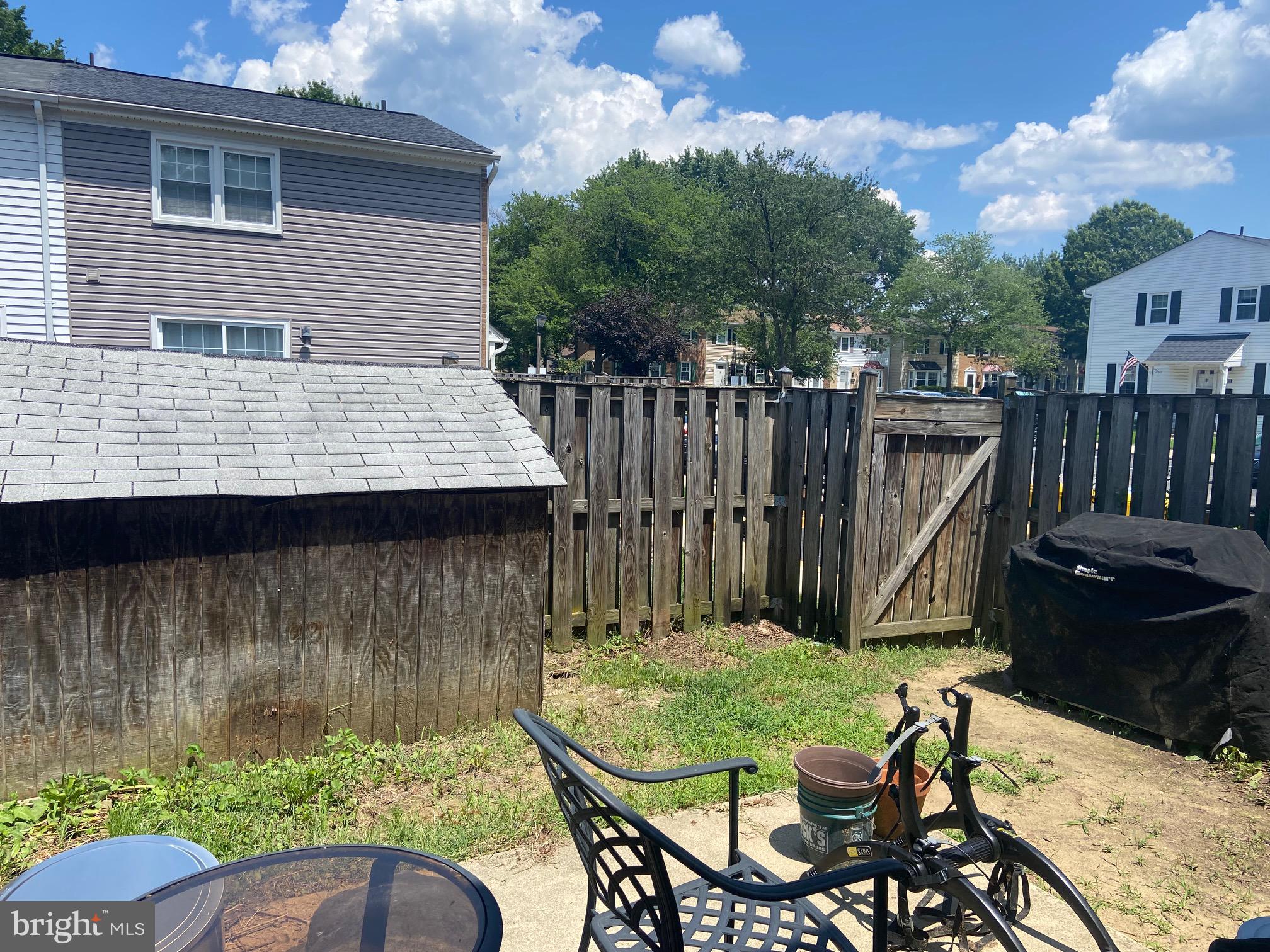 1761 Aberdeen Circle Crofton, MD 21114 - Photo 11 of 33 a view of backyard with a patio and outdoor seating