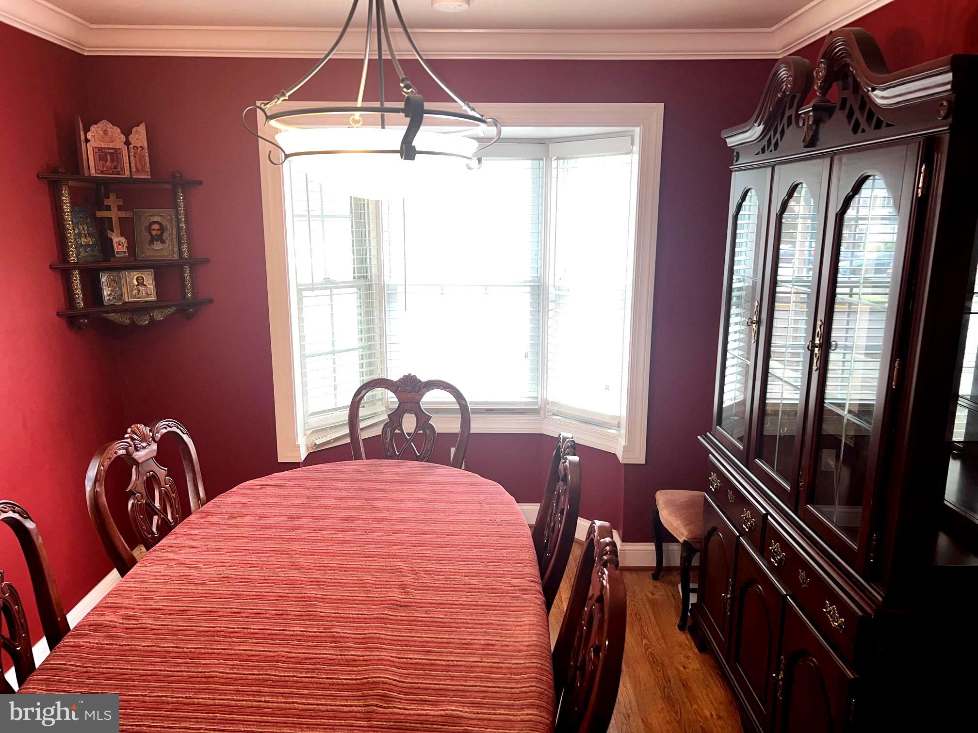 1761 Aberdeen Circle Crofton, MD 21114 - Photo 14 of 33 a bedroom with a bed and wooden floor