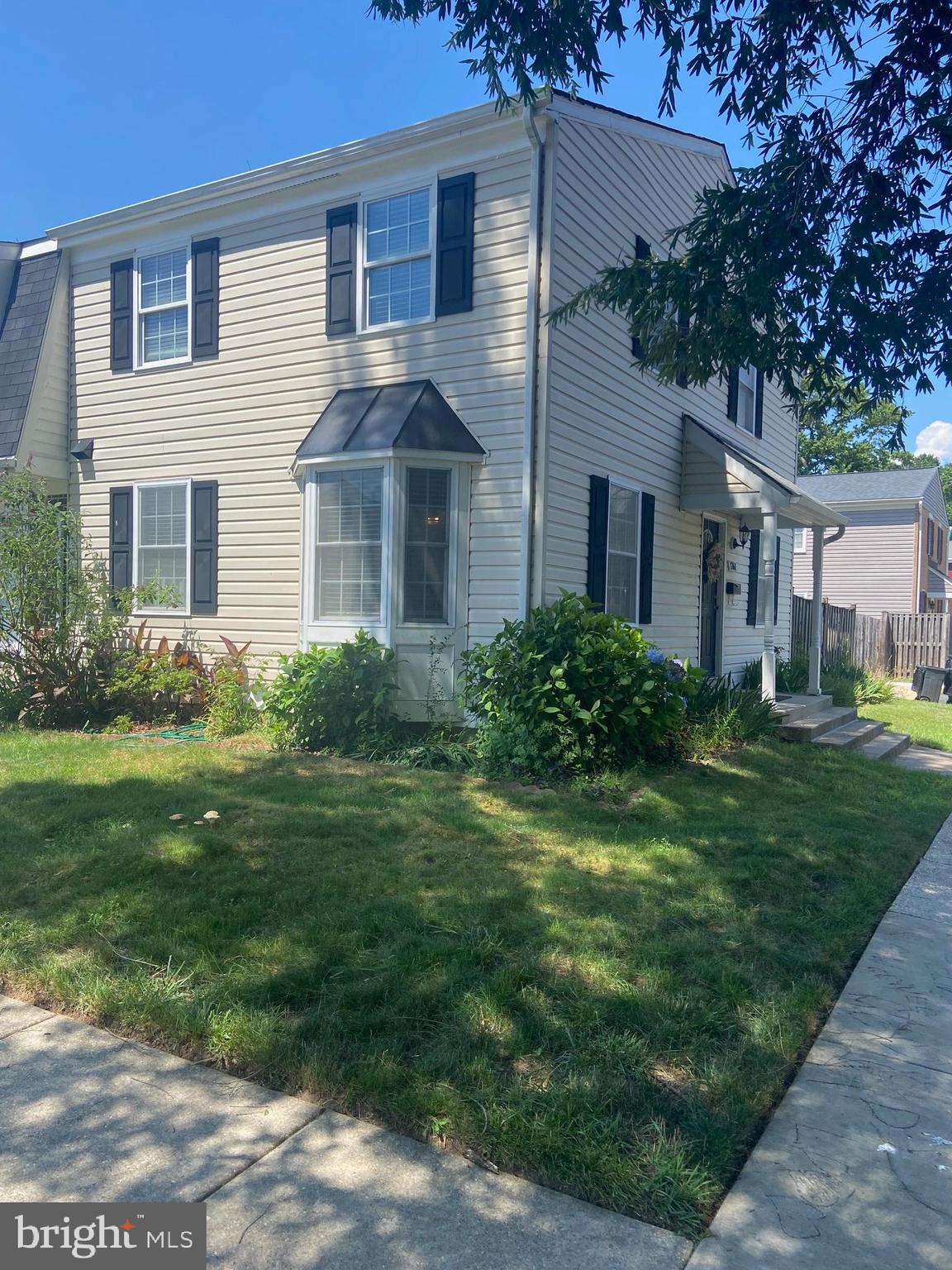 1761 Aberdeen Circle Crofton, MD 21114 - Photo 2 of 33 a front view of a house with a garden