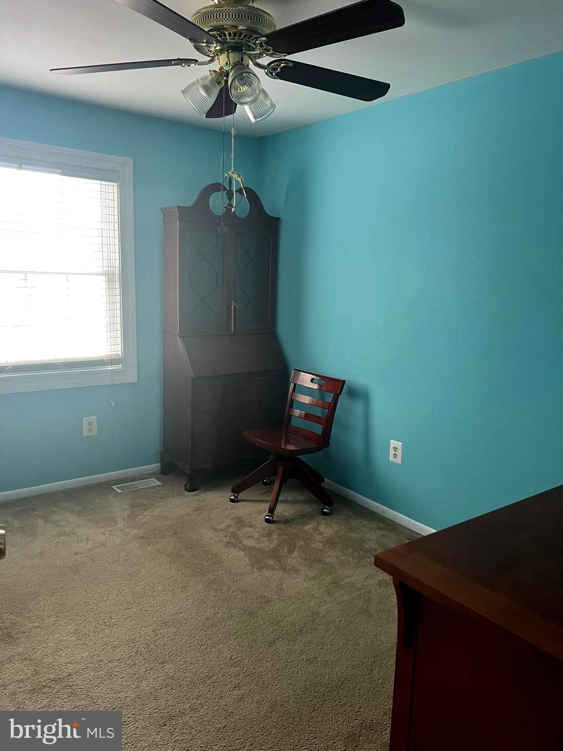 1761 Aberdeen Circle Crofton, MD 21114 - Photo 22 of 33 a living room with furniture and a window