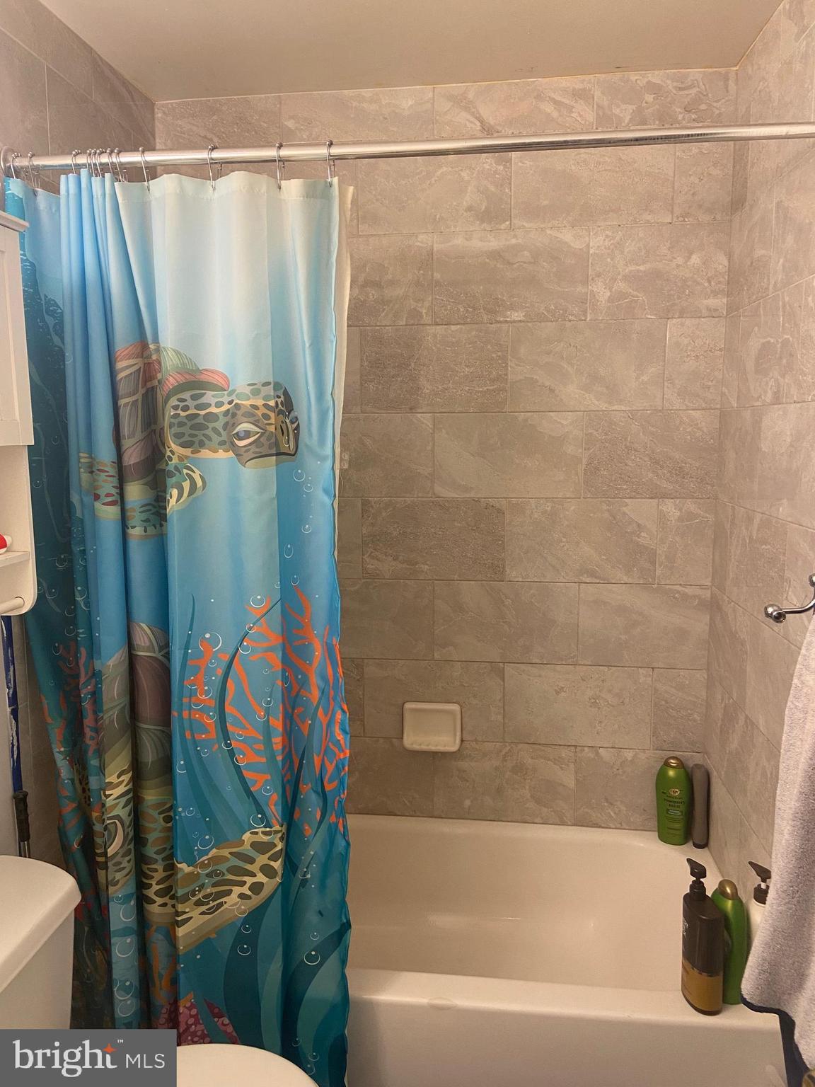 1761 Aberdeen Circle Crofton, MD 21114 - Photo 26 of 33 a bathroom with a shower and a toilet