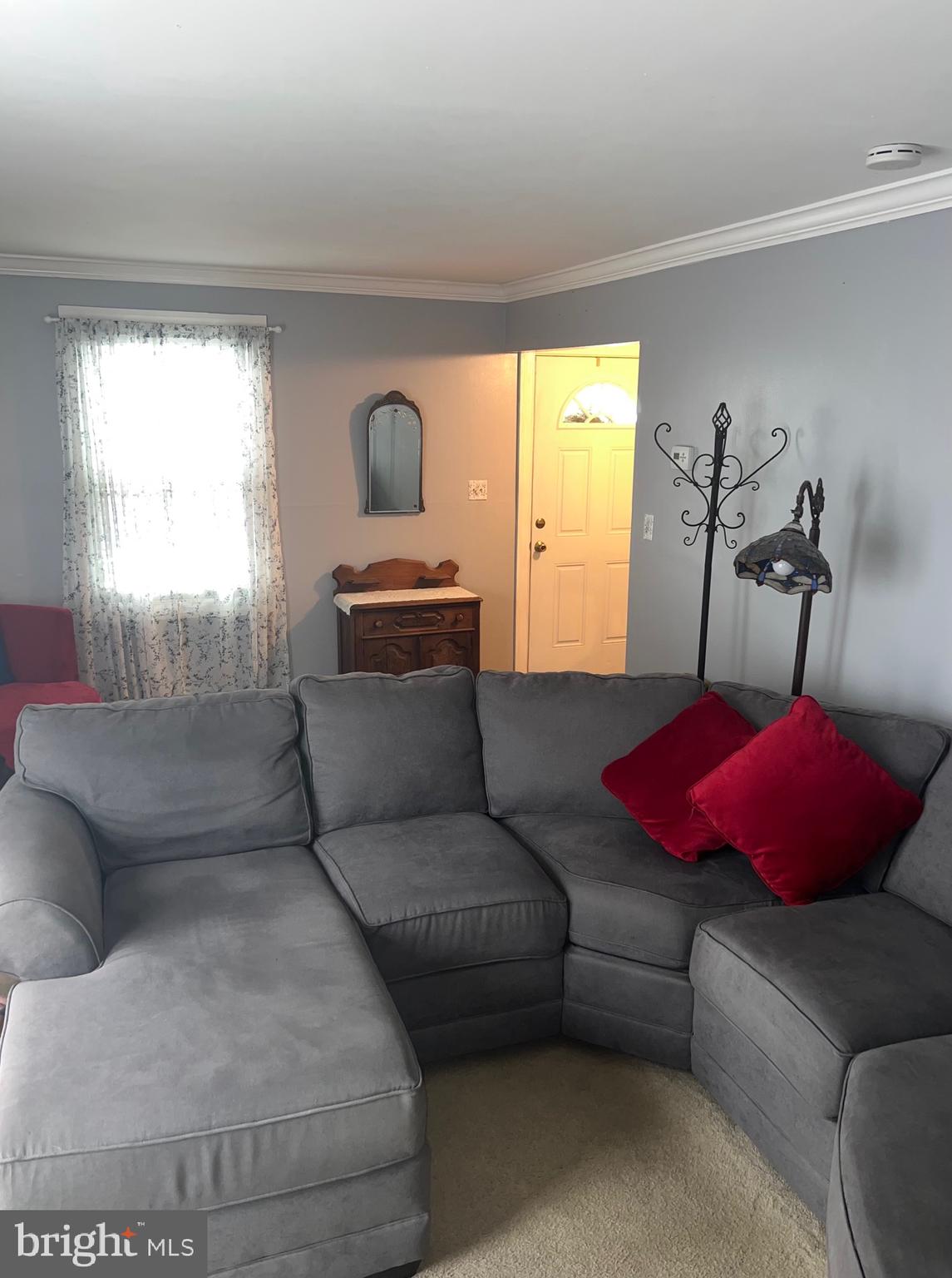 1761 Aberdeen Circle Crofton, MD 21114 - Photo 7 of 33 a living room with furniture and a large window