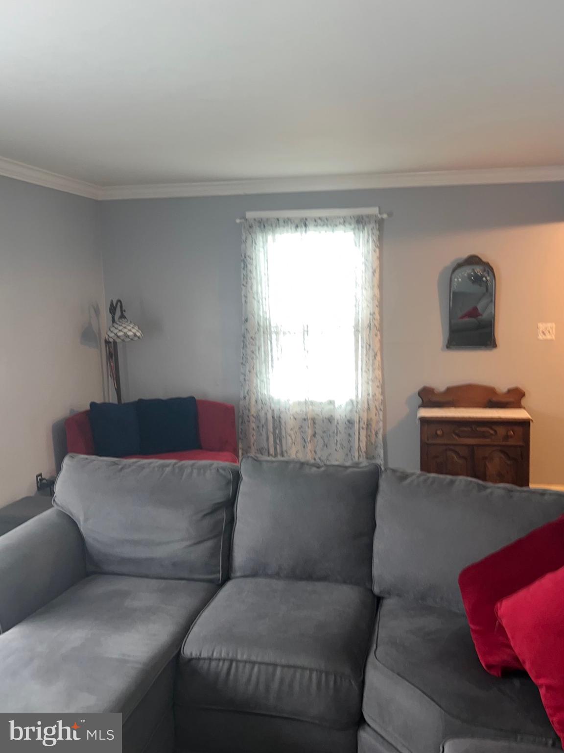 1761 Aberdeen Circle Crofton, MD 21114 - Photo 8 of 33 a living room with furniture and a window