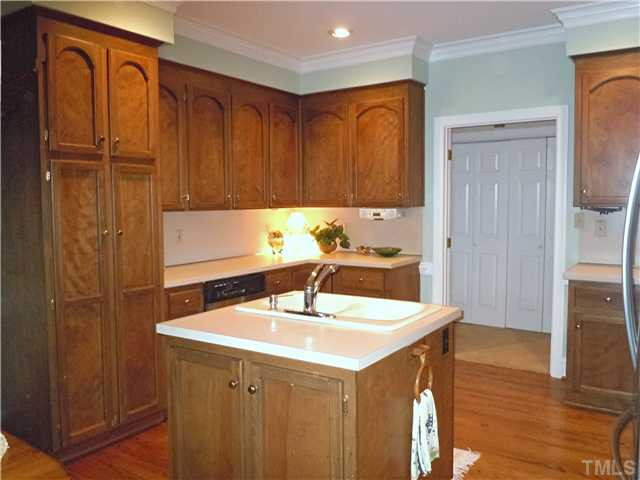4620 Thendara Way Raleigh, NC 27612 - Photo 6 of 18 ANOTHER VIEW OF THE KITCHEN INCLUDING THE BUILT-IN PANTRY WITH LOTS OF STORAGE Kitchen