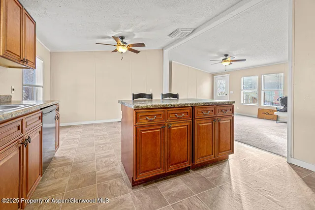a kitchen with a cabinets and counter space