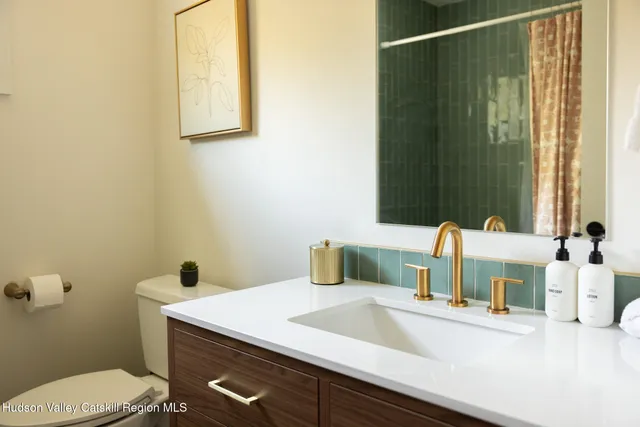 a bathroom with a sink and a toilet