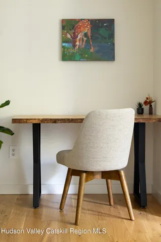 a view of a room with table and chair