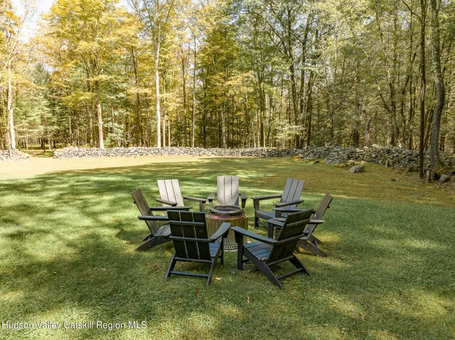 a aerial view of a house with a yard