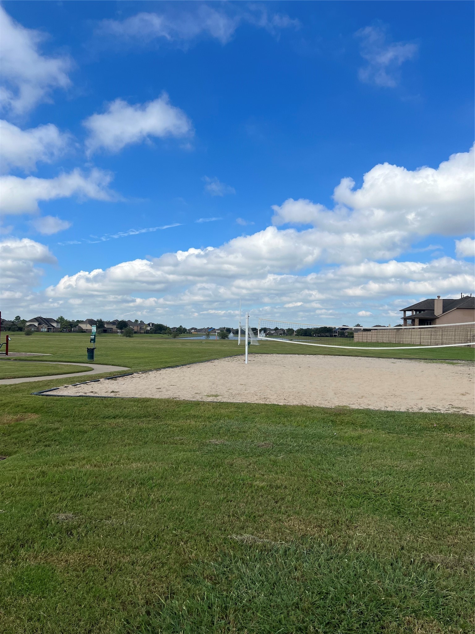 9919 Opal Rock Drive Rosharon, TX 77583 - Photo 16 of 21 a view of a lake with a big yard