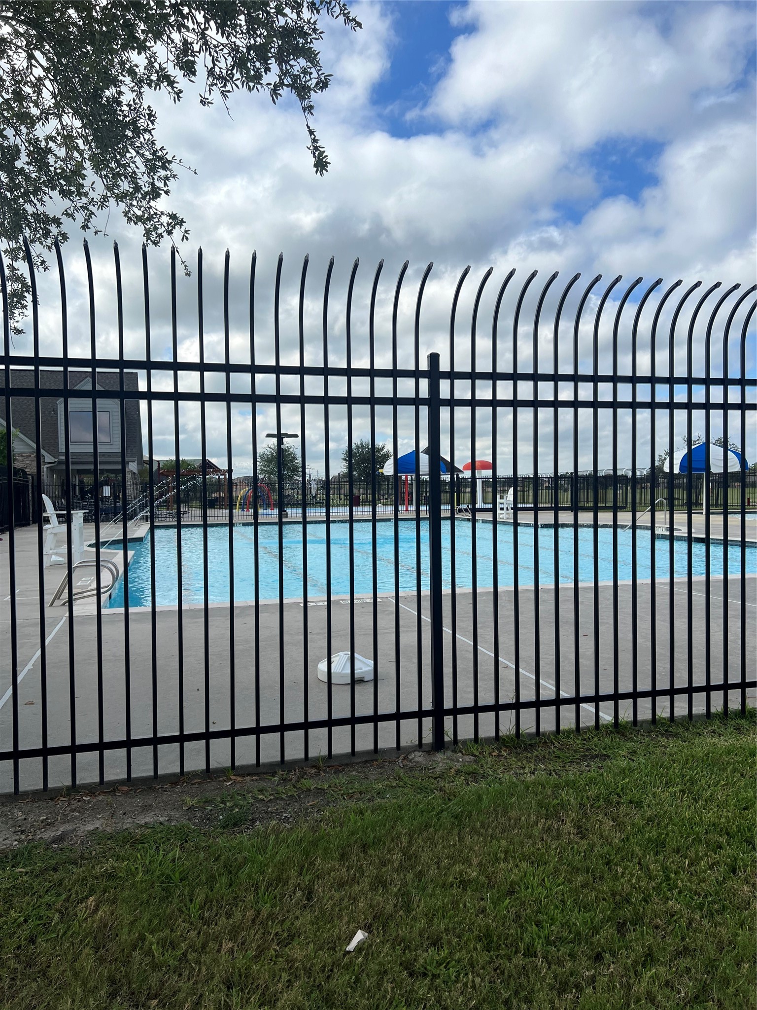 9919 Opal Rock Drive Rosharon, TX 77583 - Photo 17 of 21 a view of a black gate