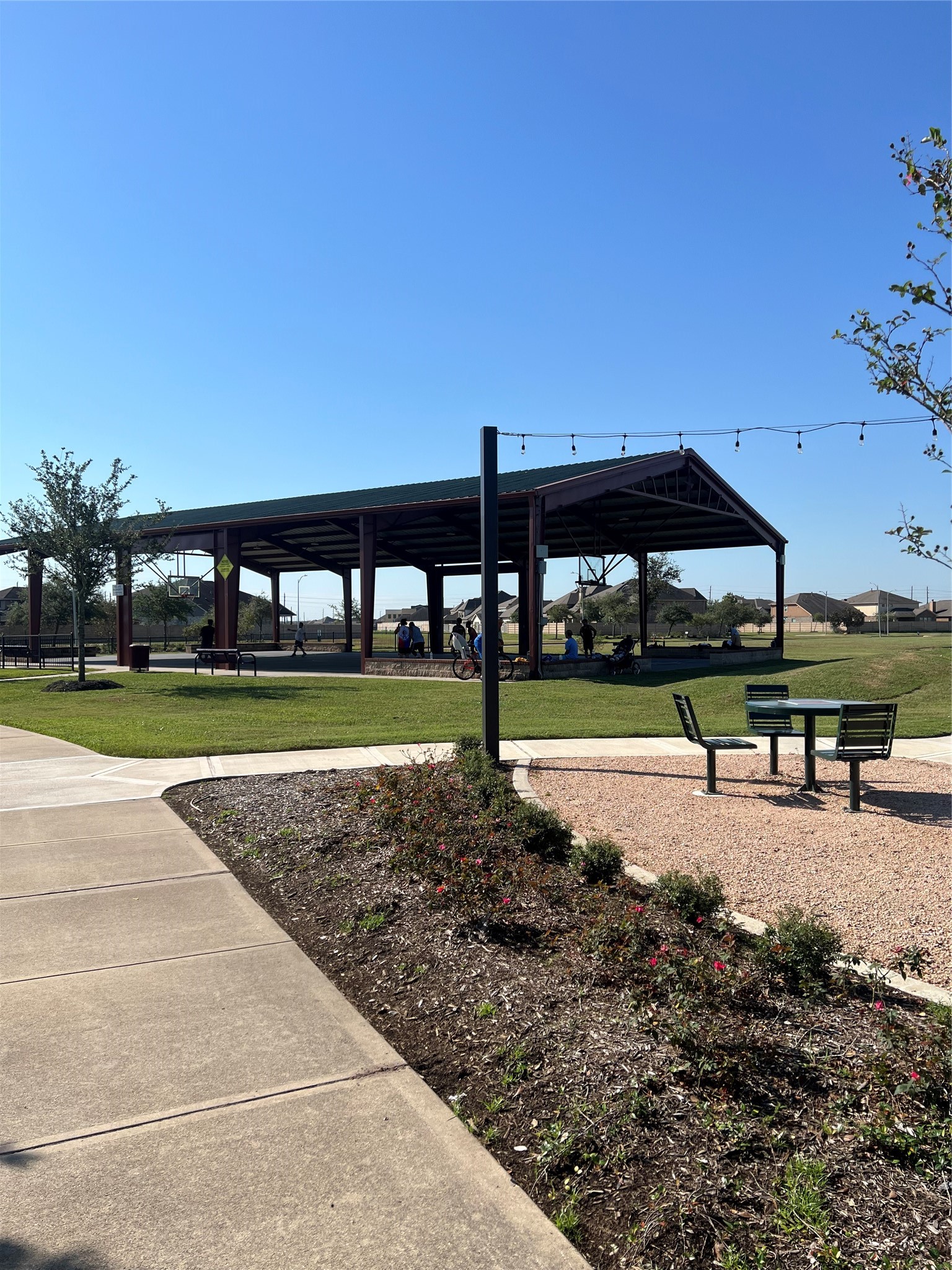 9919 Opal Rock Drive Rosharon, TX 77583 - Photo 18 of 21 a view of a park with swings and slides