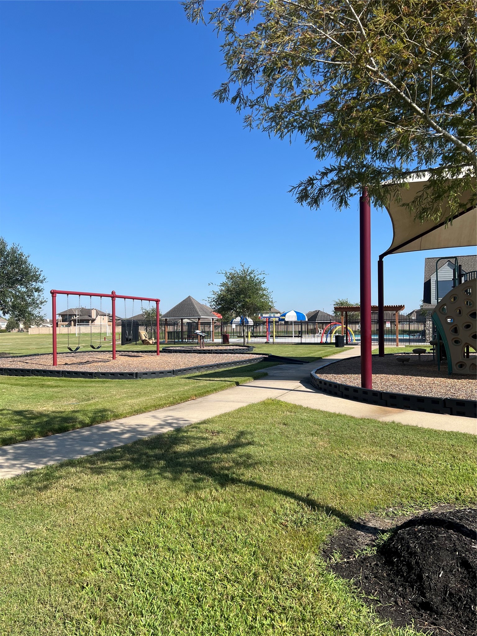 9919 Opal Rock Drive Rosharon, TX 77583 - Photo 20 of 21 a view of a swimming pool and an outdoor space