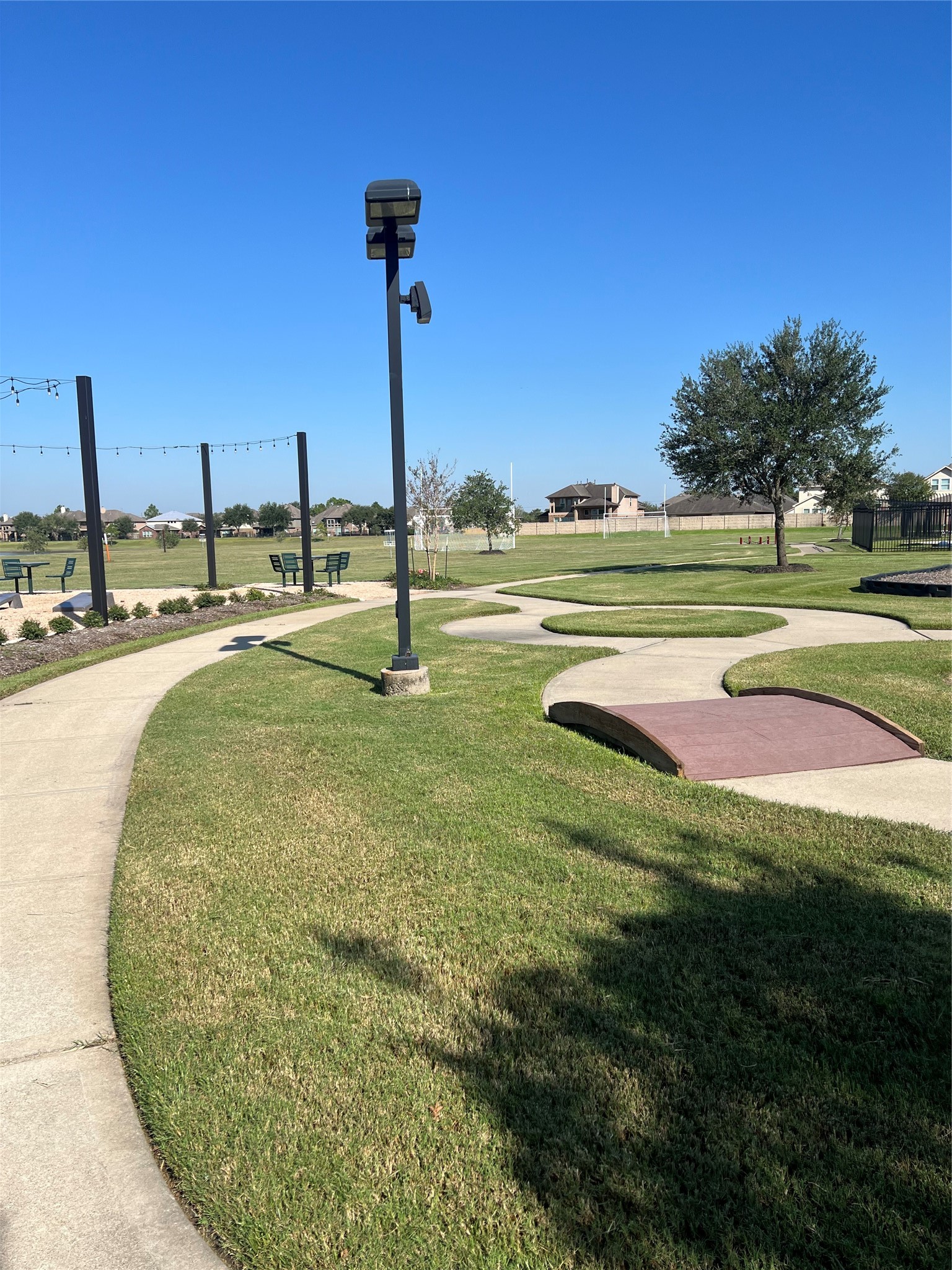 9919 Opal Rock Drive Rosharon, TX 77583 - Photo 21 of 21 a view of a swimming pool and a yard