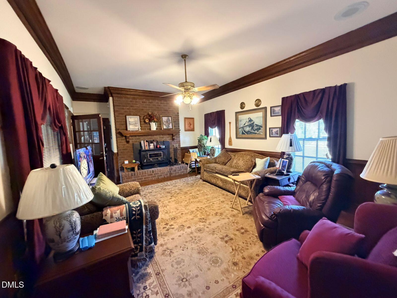 9222 Midway Road Bailey, NC 27807 - Photo 12 of 35 a living room with furniture and wooden floor