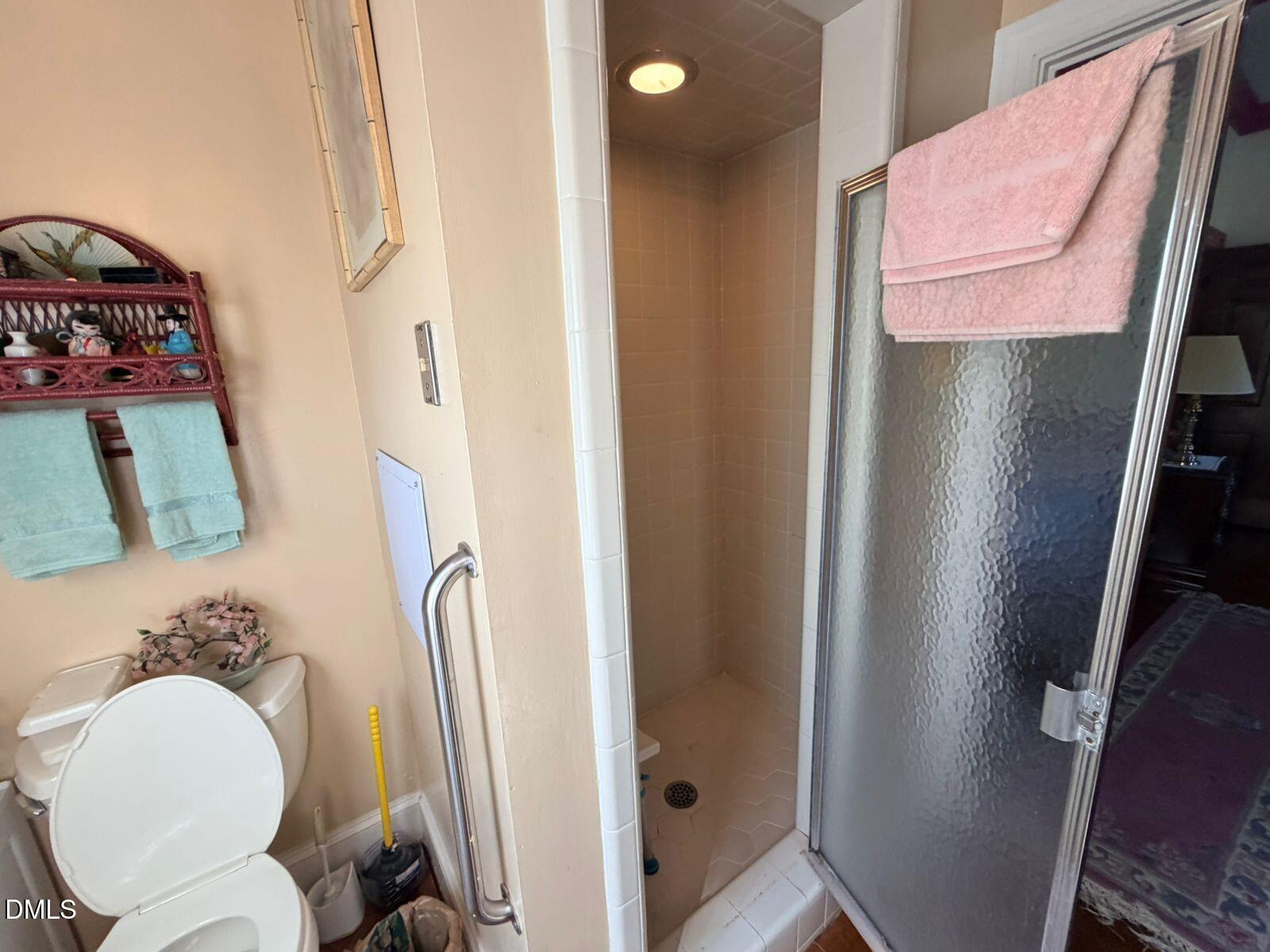 9222 Midway Road Bailey, NC 27807 - Photo 14 of 35 a bathroom with a sink and a mirror